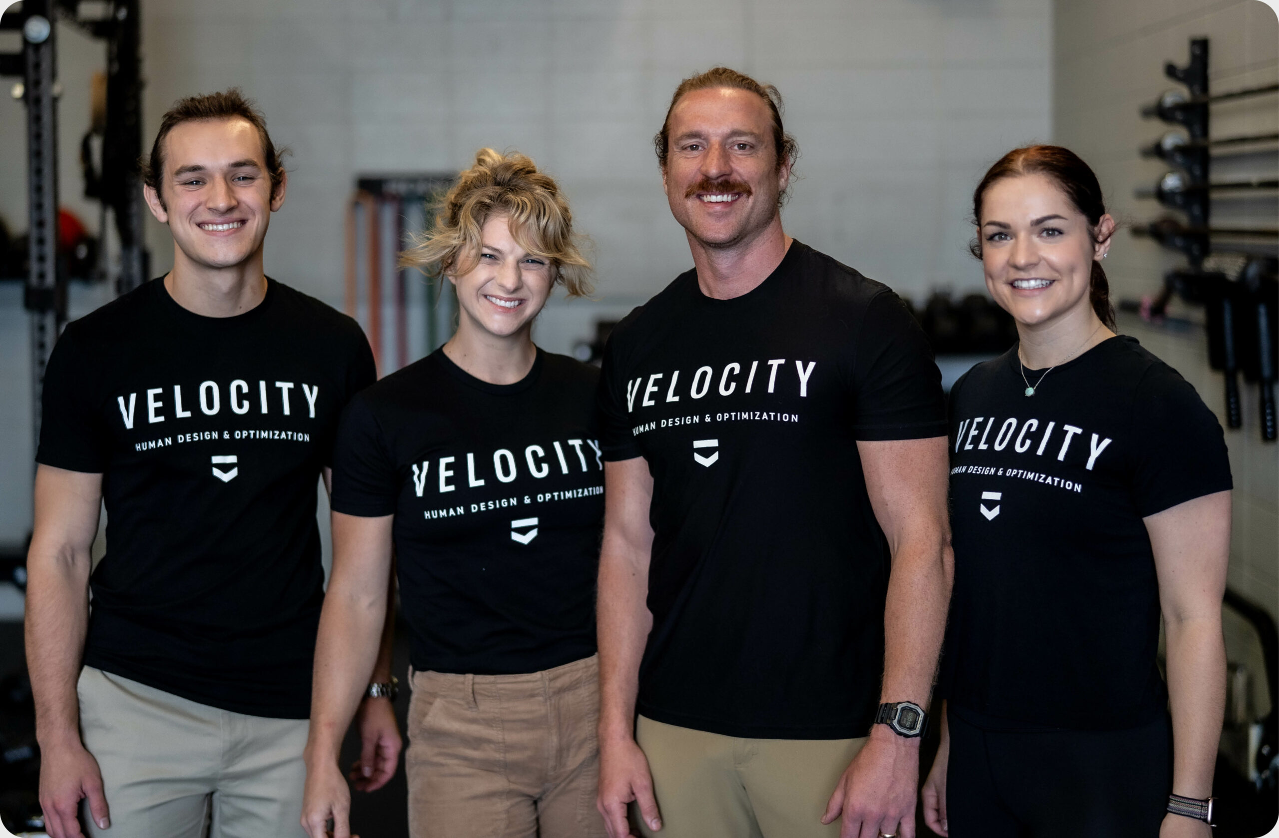 4 velocity trainers wearing black velocity t-shirts